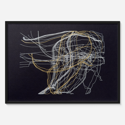 Framed abstract art with gold and white lines on a black background